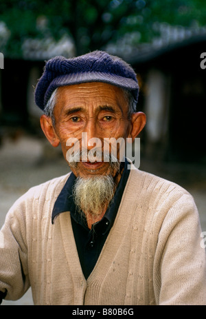 1, one, Chinese man, Bai man, ethnic minority, old man, eye contact, front view, headshot, head shot, portrait, Shaping, Yunnan Province, China Stock Photo