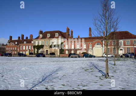 Snow covered Cathedral Close Salisbury city centre Wiltshire England UK Stock Photo