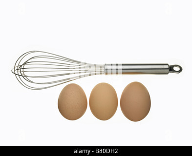 eggs and whisk Stock Photo