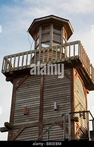 Lighthouse shaped tower at restaurant along coastline in Cedar Key, Florida, USA Stock Photo