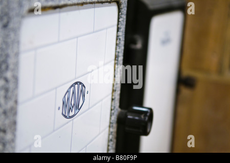 Oven door of a cast iron 'Main' gas cooker from c1900-1920. Stock Photo