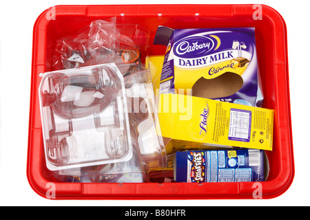 pile of various empty easter egg boxes packaging and cartons from uk manufacturers placed for recycling in a kerbie kerbside Stock Photo