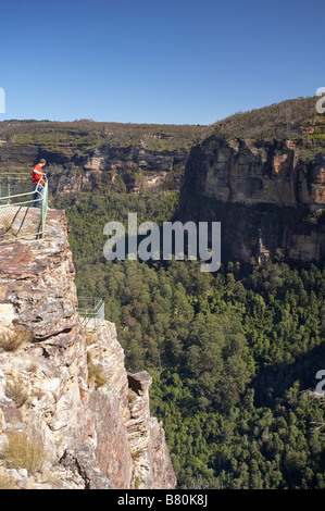 Tourist on Pulpit Rock Grose Valley near Blackheath Blue Mountains New South Wales Australia Stock Photo