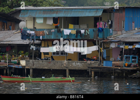 Houses in poor neighbourhood at the waterfront of Jayapura, Indonesia. Stock Photo