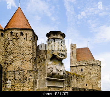 Statue at Narbonne Gate at Carcassonne in the Languedoc Roussillon region of South West France. Stock Photo