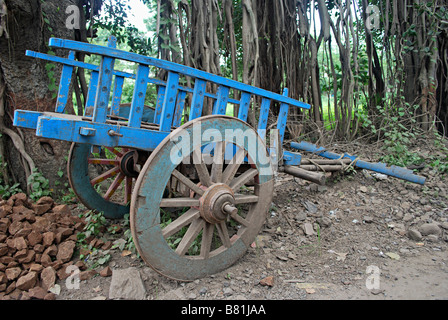Bullock cart without bulls parked at the side of the Sinhgad road, Maharashtra, India. Stock Photo