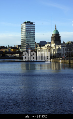 Dublin City Centre, Custom House and Liberty Hall buildings on the banks of Liffey River Stock Photo