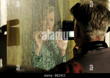 Director David Lynch with Laura Dern on the set of  Inland Empire  Year: 2006 USA Stock Photo