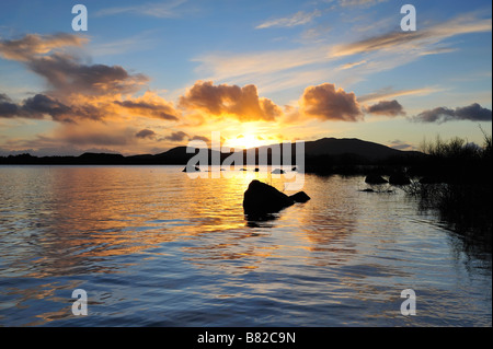 beatiful scene as sun sets over Lough Conn Co Mayo Ireland Stock Photo