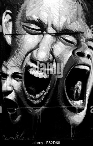 Graffiti screaming faces black and white Stock Photo