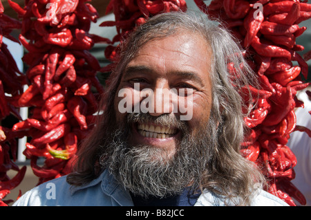 Smiling face of chilli stall holder Sunday market Santa Fe New Mexico USA Stock Photo