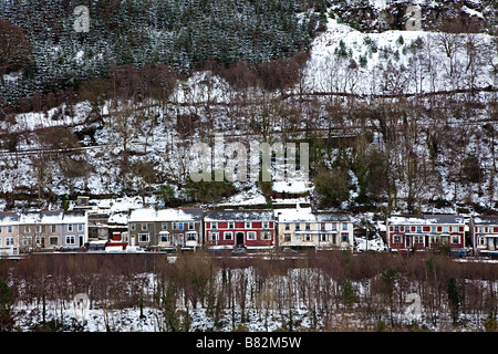 Street of houses at Six Bells in the South Wales valleys in winter Wales UK Stock Photo