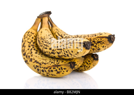 Cluster of over ripe bananas isolated on white background.. Stock Photo