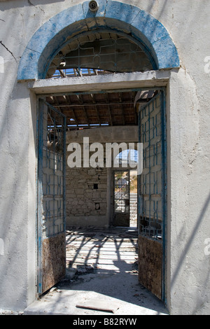 View throught the Agios Nicolas (Alasa) Church in flooded  area near Kouris Dam trough window. South Cyprus Stock Photo