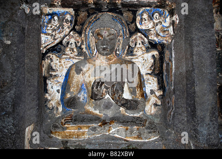 Buddha in Padmasana, once fully painted, Ajanta Caves, Maharashtra, India. Stock Photo