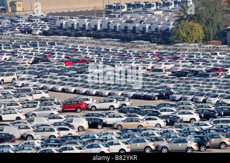 Abu Dhabi looking down close up on dockside storage of imported new cars and trucks awaiting distribution Stock Photo