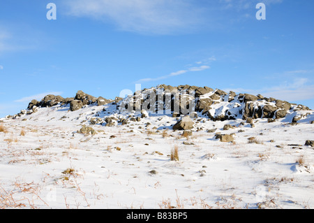Snow covered stony outcrop Black Mountain Brecon Beacons National Park Carmarthenshire Wales Stock Photo