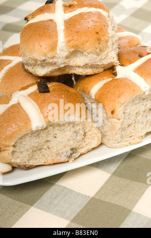 Close up of fresh hot cross buns on a plate Stock Photo