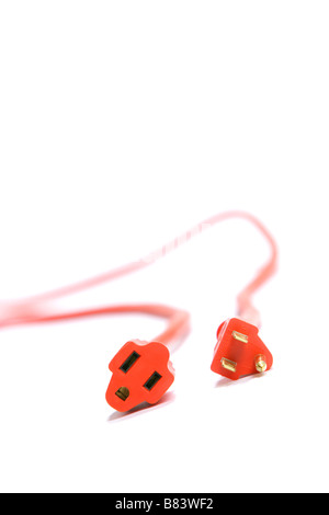 A 100 foot orange extension cord coiled up with a three way splitter Stock Photo
