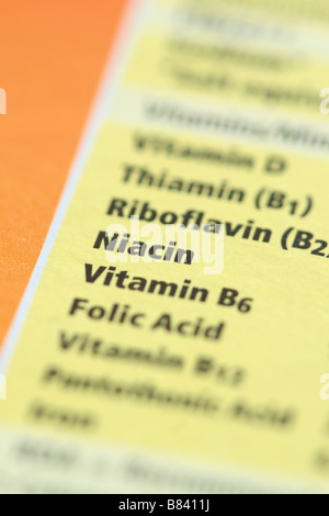 Food nutrition nutritional information about vitamins Niacin Riboflavin on breakfast cereal packet Stock Photo