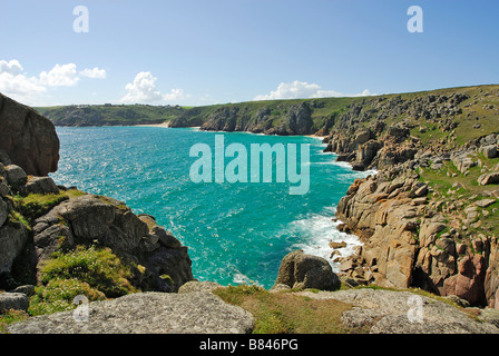 Logan Rock towards Porthcurno Cornwall UK Stock Photo