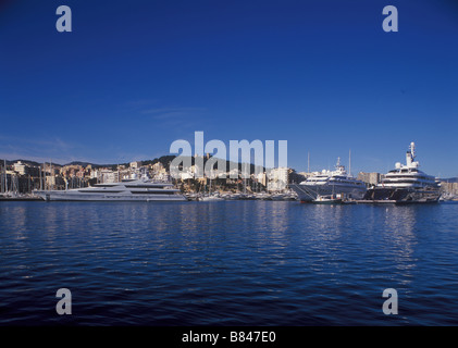 Megayachts / Superyachts in Club de Mar Marina within the Port of Palma de Mallorca. Al Mirqab + Lady Moura + Stargate. Stock Photo
