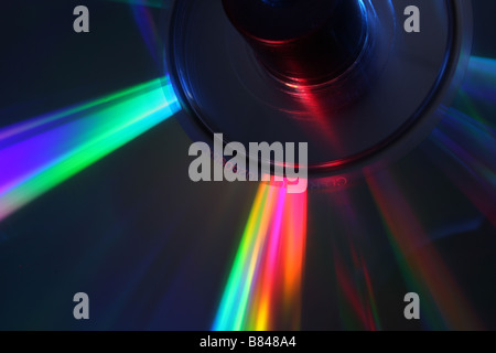 stack of CD's on a spindle lit with red and blue studio lighting Stock Photo