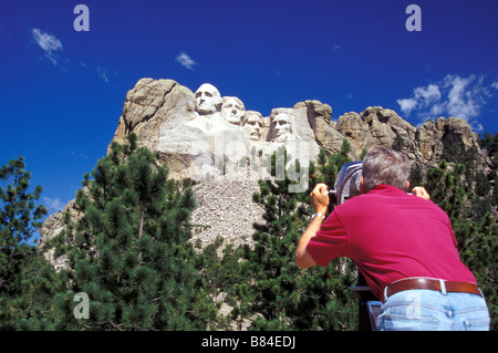 Male tourist viewing Mount Rushmore Stock Photo