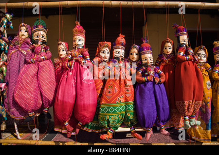 Traditional and very colorful Rajasthani puppets for sale in Jaipur Stock Photo