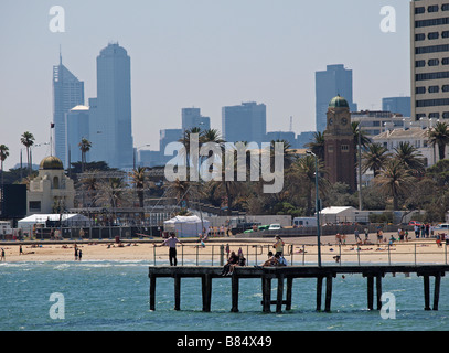 PIER AND BEACH AT ST KILDA WITH CITY SKYLINE OF MELBOURNE IN BACKGROUND VICTORIA AUSTRALIA Stock Photo