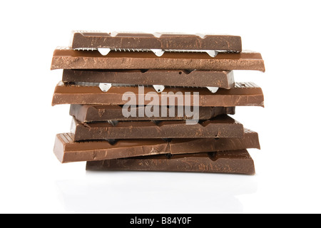 Broken milk and dark chocolate bar isolated on white background Stock Photo