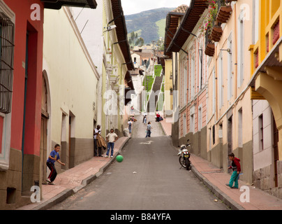 Kids playing football in the Old Town, Quito, Ecuador Stock Photo