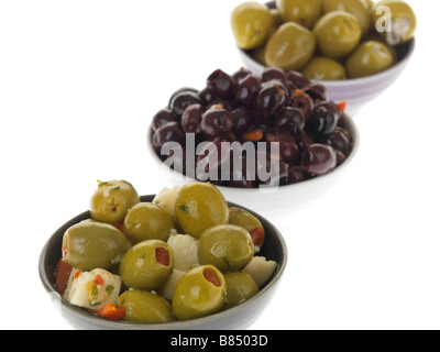 Bowls Of Mixed Green And Black Healthy Ripe Savoury Olives Isolated Against A White Background With A Clipping Path And No People Stock Photo