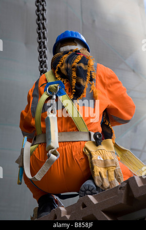 construction worker wearing protective clothing hard hat Stock Photo