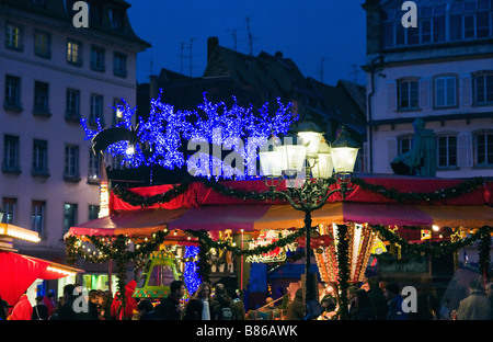 Carousel at dusk, Christmas time, Strasbourg, Alsace, France Stock Photo