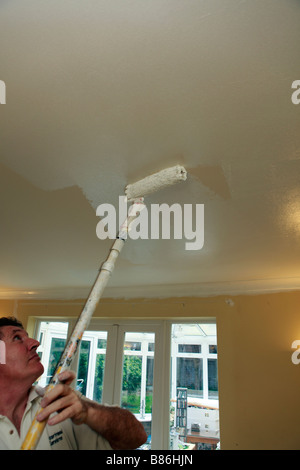 united kingdom a decorator at work in a private house Stock Photo
