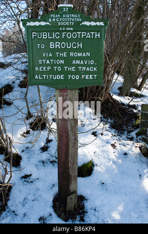 A public footpath signpost covered in fresh snow in the UK Stock Photo ...