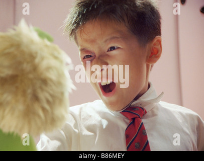 Hong Kong director Stephen Chow signs an autograph during a promotional  event for his movie The Mermaid in Fuzhou city, southeast China's Fujian  pro Stock Photo - Alamy