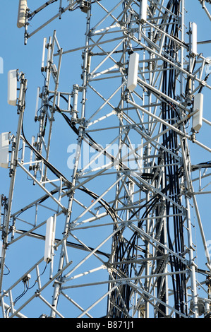 Graphic close up of a cell phone tower with antennas for cellular mobile phones with cables and metal grid work. USA Stock Photo