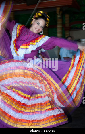 A Mexican folkloric dancer swirls in La Paz, Baja California Sur, Mexico Stock Photo