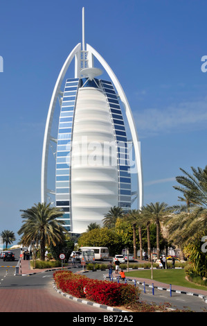 Dubai iconic shape of famous Burj Al Arab luxury landmark hotel building with helipad all on an artifical island United Arab Emirates Middle East Asia Stock Photo
