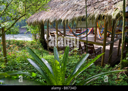 Central America, Costa Rica. A lodge sits in the lush jungle near The Pacuare River. Stock Photo