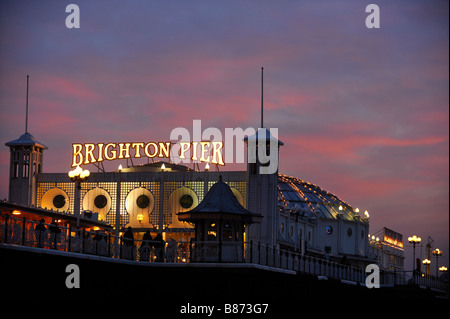Brighton Pier at dusk with the night life just starting. Picture by Jim Holden.