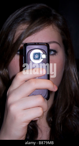 Girl using photo camera  Teenagers Model released Stock Photo