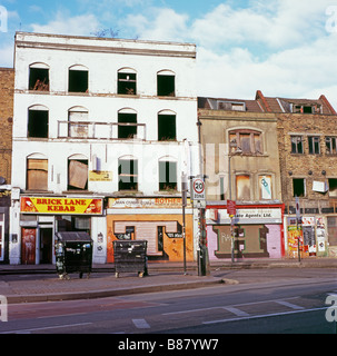 A row of derelict shops and building at the junction of Redchurch Street and Commercial Street near Brick Lane, East End in London UK   KATHY DEWITT Stock Photo