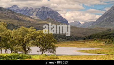 lake and mountain view in Torridon northwest Scotland with Liathach in background. Stock Photo
