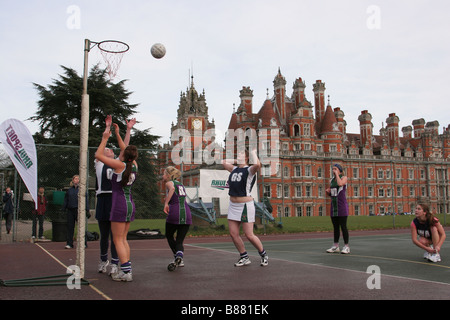 A shot in a netball match in front of the Founder’s Building Royal Holloway University of London Egham Surrey Stock Photo