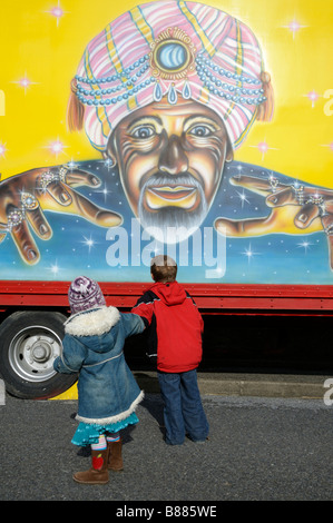 sister pulling brother in wagon Stock Photo - Alamy