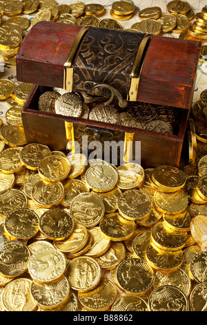Gold box and gold coins Stock Photo