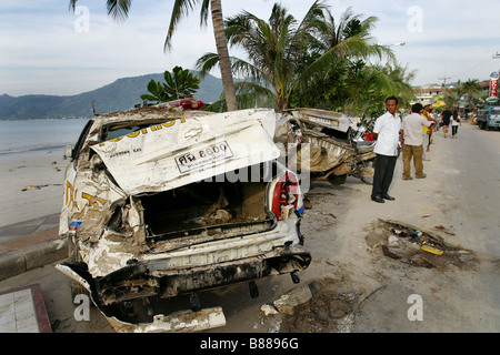 Debris and vehicles line the streets after the December 26, 2004 tsunami hit Patong Beach on Phuket Island, Thailand. Stock Photo